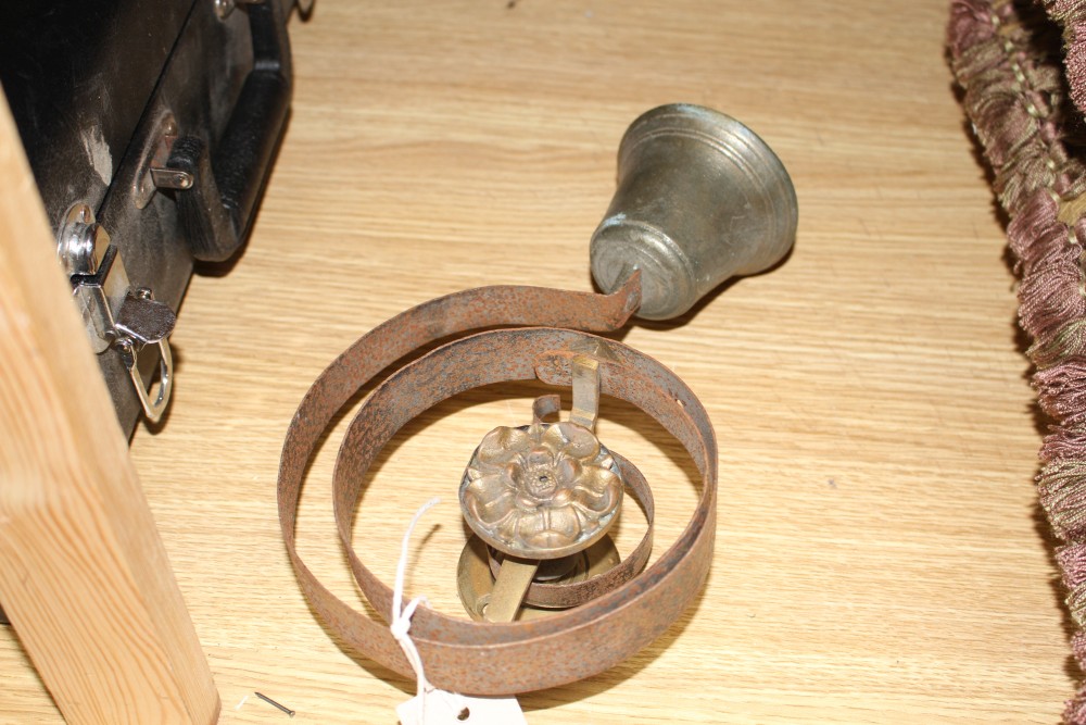 Two antique wrought iron and brass shop bells, height 33cm and 24cm